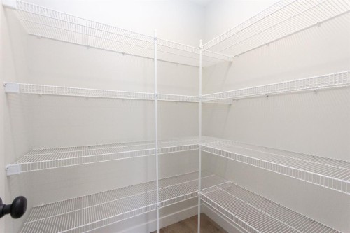 208 Augustus Way, Penhold, AB - Indoor With Storage