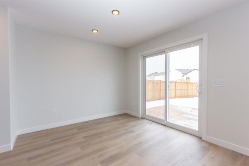 208 Augustus Way, Penhold, AB - Indoor Photo Showing Other Room
