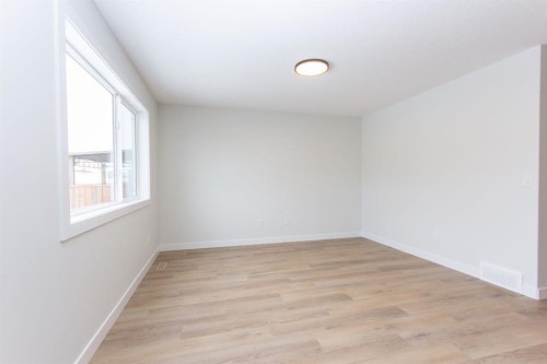 208 Augustus Way, Penhold, AB - Indoor Photo Showing Other Room