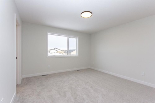 208 Augustus Way, Penhold, AB - Indoor Photo Showing Other Room
