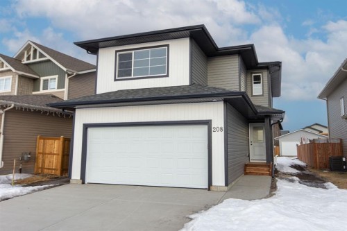 208 Augustus Way, Penhold, AB - Outdoor With Exterior
