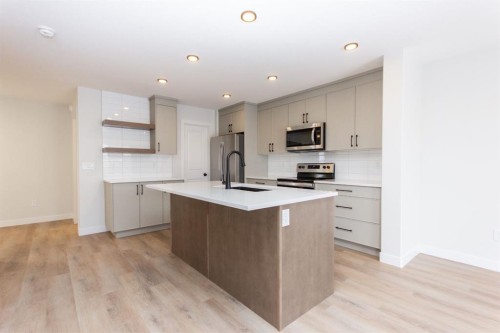 208 Augustus Way, Penhold, AB - Indoor Photo Showing Kitchen With Upgraded Kitchen