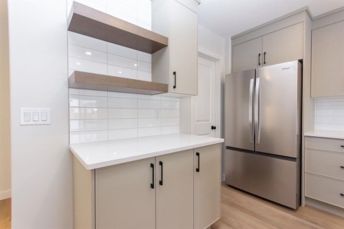 208 Augustus Way, Penhold, AB - Indoor Photo Showing Kitchen