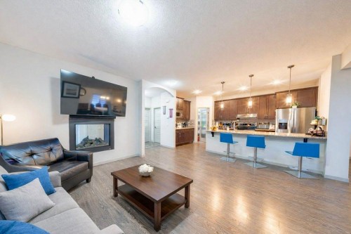 78 Caribou Crescent, Red Deer, AB - Indoor Photo Showing Living Room With Fireplace