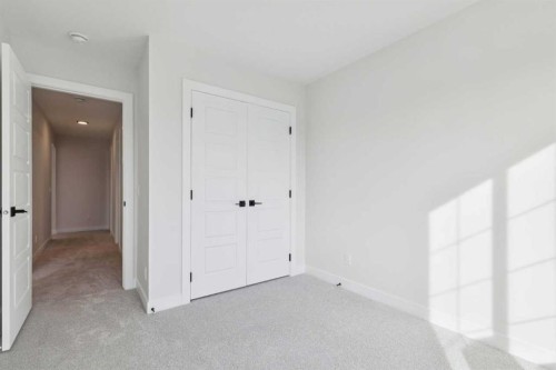 79 Versant Rise Sw, Calgary, AB - Indoor Photo Showing Other Room
