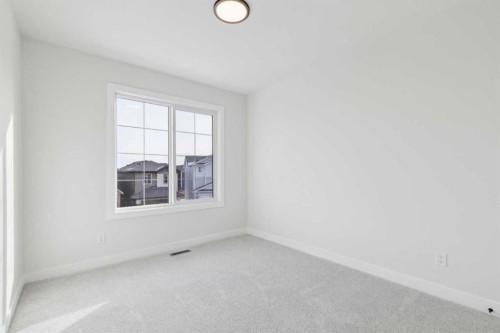 79 Versant Rise Sw, Calgary, AB - Indoor Photo Showing Other Room