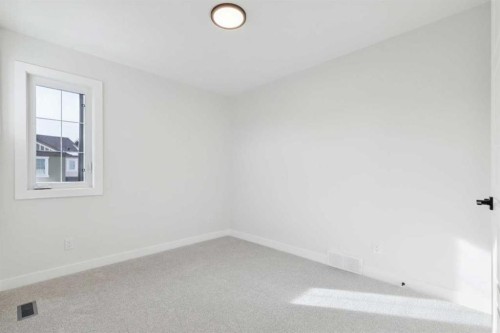79 Versant Rise Sw, Calgary, AB - Indoor Photo Showing Other Room