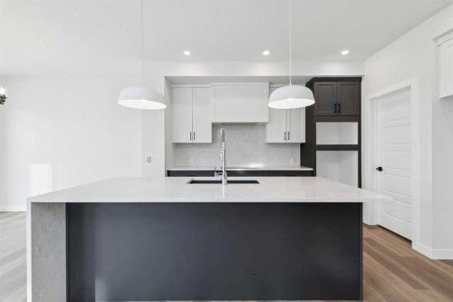 79 Versant Rise Sw, Calgary, AB - Indoor Photo Showing Kitchen With Upgraded Kitchen