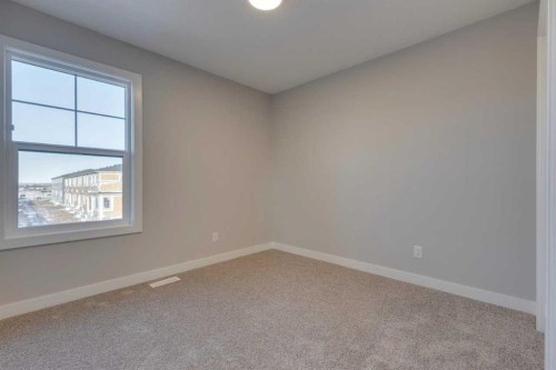 315 Fireside Drive, Cochrane, AB - Indoor Photo Showing Other Room