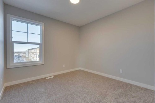 315 Fireside Drive, Cochrane, AB - Indoor Photo Showing Other Room