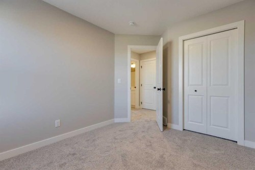 315 Fireside Drive, Cochrane, AB - Indoor Photo Showing Other Room