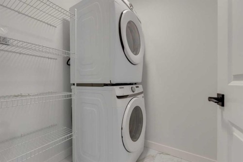 367 Fireside Drive, Cochrane, AB - Indoor Photo Showing Laundry Room