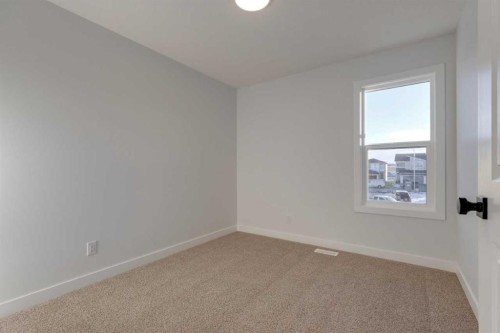 371 Fireside Drive, Cochrane, AB - Indoor Photo Showing Other Room