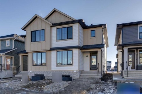 371 Fireside Drive, Cochrane, AB - Outdoor With Facade