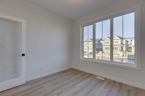 371 Fireside Drive, Cochrane, AB - Indoor Photo Showing Other Room