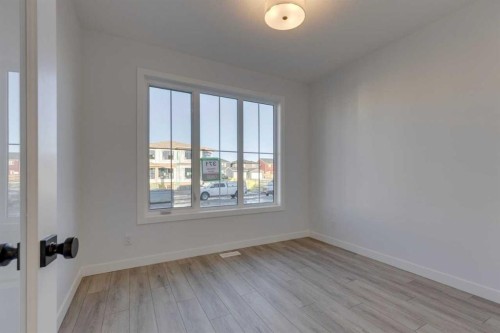 371 Fireside Drive, Cochrane, AB - Indoor Photo Showing Other Room