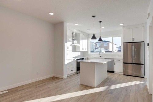 371 Fireside Drive, Cochrane, AB - Indoor Photo Showing Kitchen With Upgraded Kitchen