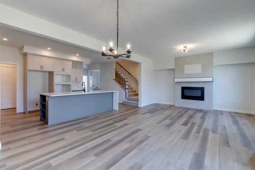 146 Northern Lights Crescent, Langdon, AB - Indoor With Fireplace