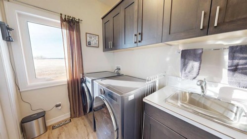 4020 Monarch Way, Stettler, AB - Indoor Photo Showing Laundry Room