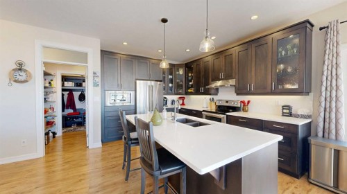 4020 Monarch Way, Stettler, AB - Indoor Photo Showing Kitchen With Stainless Steel Kitchen With Double Sink With Upgraded Kitchen