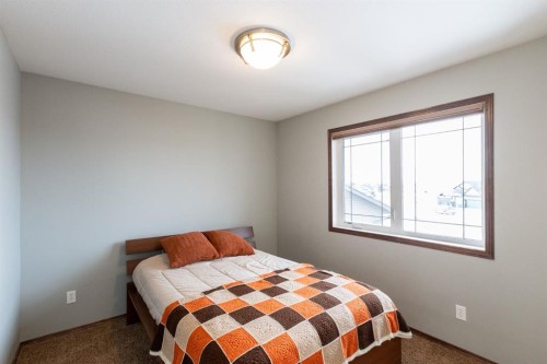 4828 55 Boulevard Close, Innisfail, AB - Indoor Photo Showing Bedroom