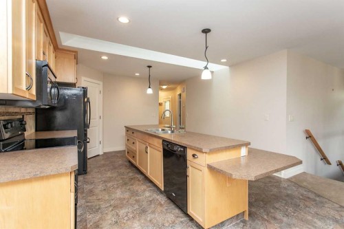 5422 49 Avenue, Lacombe, AB - Indoor Photo Showing Kitchen With Double Sink