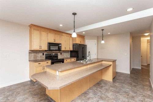 5422 49 Avenue, Lacombe, AB - Indoor Photo Showing Kitchen With Double Sink