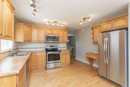 210 Lindsay Avenue, Red Deer, AB - Indoor Photo Showing Kitchen With Stainless Steel Kitchen With Double Sink