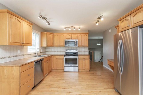 210 Lindsay Avenue, Red Deer, AB - Indoor Photo Showing Kitchen With Stainless Steel Kitchen With Double Sink