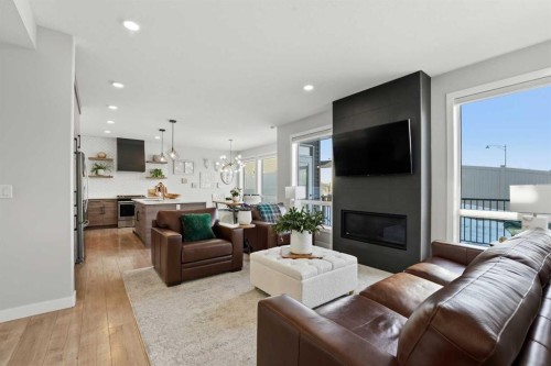 20 Ellington Crescent, Red Deer, AB - Indoor Photo Showing Living Room With Fireplace