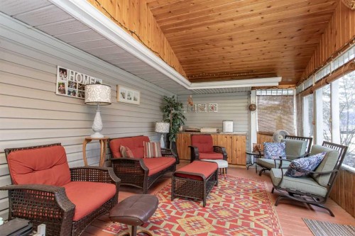 606 Pigeon Close, Pelican Point, AB - Outdoor With Deck Patio Veranda With Exterior