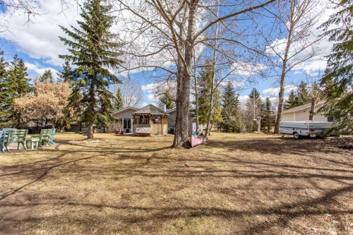 606 Pigeon Close, Pelican Point, AB - Outdoor With Deck Patio Veranda