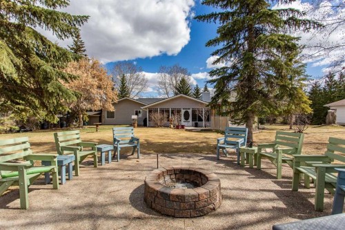 606 Pigeon Close, Pelican Point, AB - Outdoor With Deck Patio Veranda