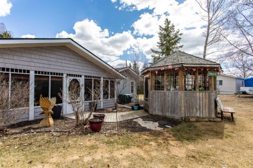 606 Pigeon Close, Pelican Point, AB - Outdoor With Deck Patio Veranda