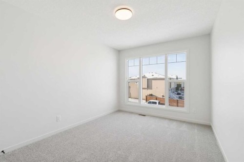 16 Calhoun Rise Ne, Calgary, AB - Indoor Photo Showing Other Room