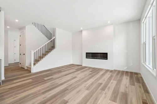16 Calhoun Rise Ne, Calgary, AB - Indoor With Fireplace