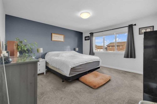 204 Augustus Way, Penhold, AB - Indoor Photo Showing Bedroom