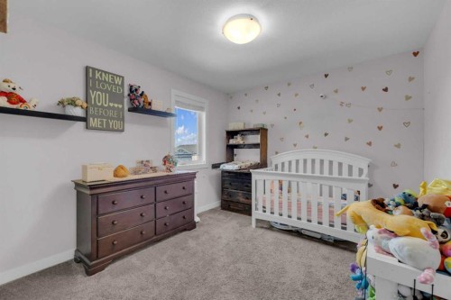 204 Augustus Way, Penhold, AB - Indoor Photo Showing Bedroom