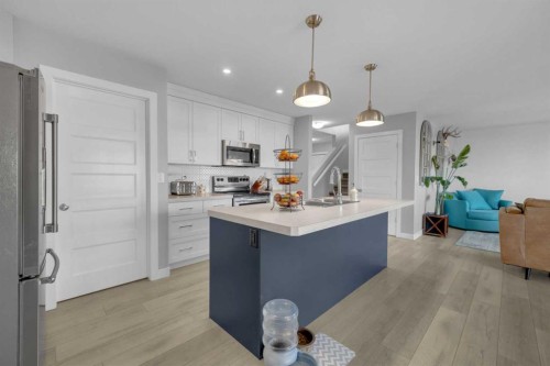 204 Augustus Way, Penhold, AB - Indoor Photo Showing Kitchen With Upgraded Kitchen
