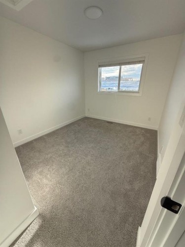 18 Violet Point, Sylvan Lake, AB - Indoor Photo Showing Other Room