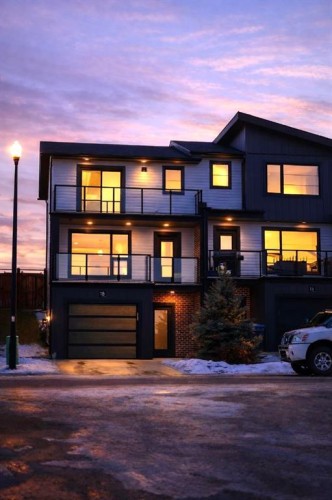 18 Violet Point, Sylvan Lake, AB - Outdoor With Balcony With Facade