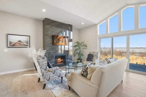 10 Twin Rose Court, Jarvis Bay, AB - Indoor Photo Showing Living Room With Fireplace