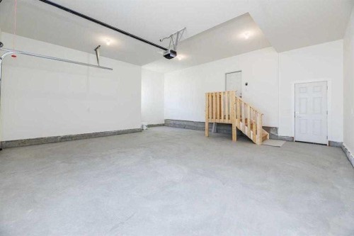 55 Everson Close, Red Deer, AB - Indoor Photo Showing Garage