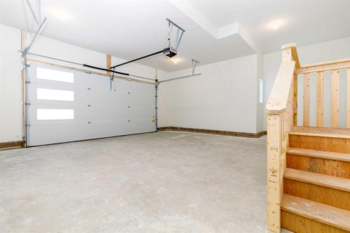 55 Everson Close, Red Deer, AB - Indoor Photo Showing Garage