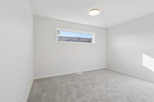 572 Belmont Heath Sw, Calgary, AB - Indoor Photo Showing Other Room
