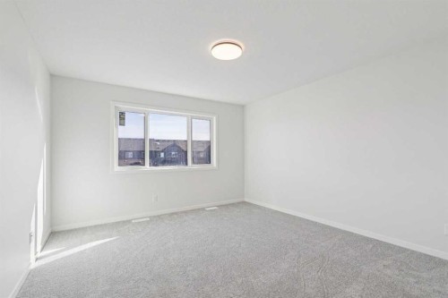 572 Belmont Heath Sw, Calgary, AB - Indoor Photo Showing Other Room