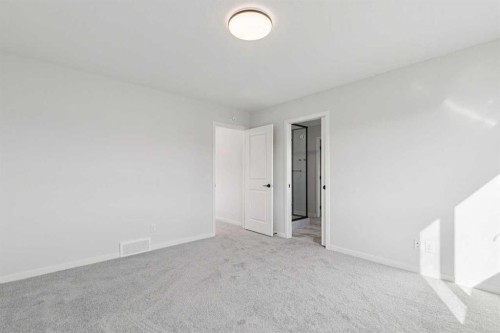 572 Belmont Heath Sw, Calgary, AB - Indoor Photo Showing Other Room