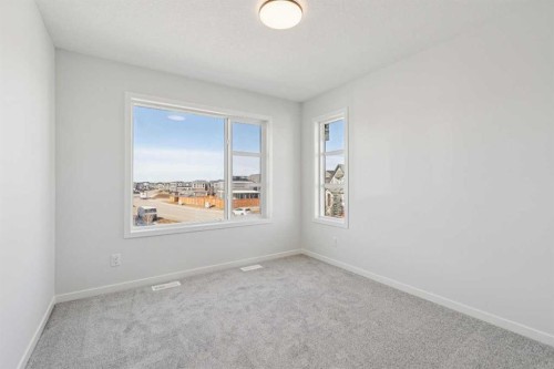 572 Belmont Heath Sw, Calgary, AB - Indoor Photo Showing Other Room