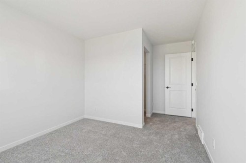 572 Belmont Heath Sw, Calgary, AB - Indoor Photo Showing Other Room