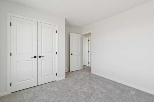 572 Belmont Heath Sw, Calgary, AB - Indoor Photo Showing Other Room